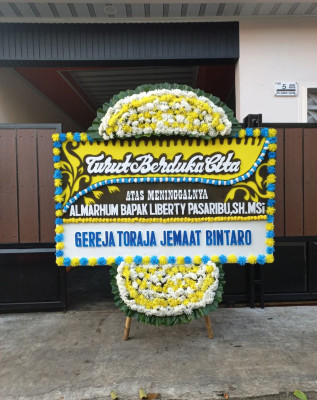 Papan Bunga Duka di Waris