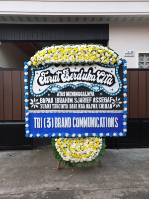 Papan Bunga Duka di Waris